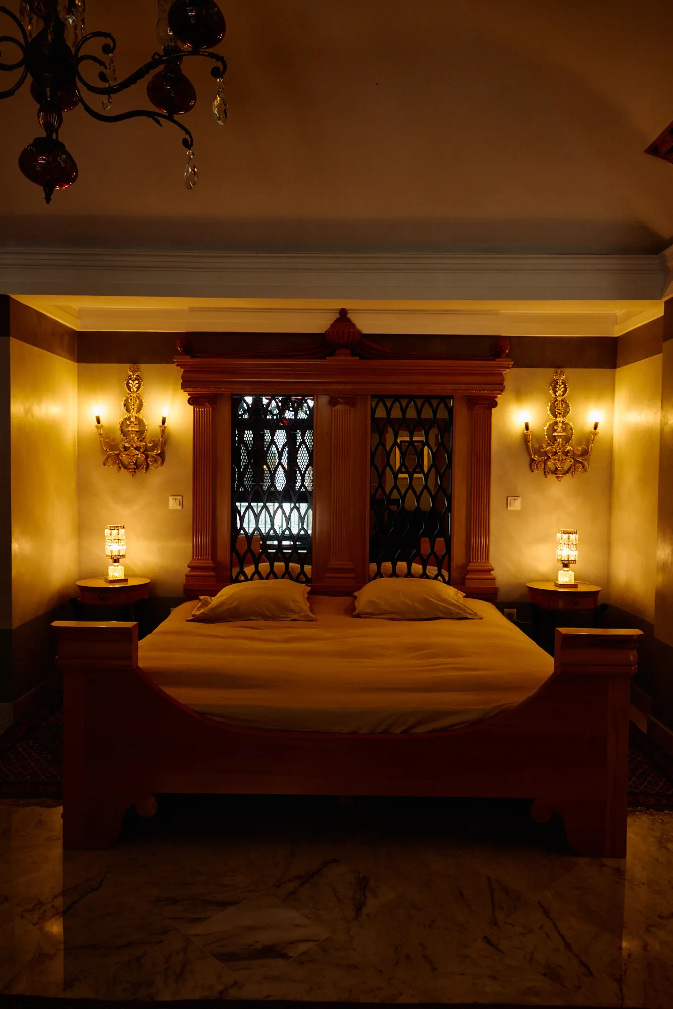 The same room seen at an angle, its woodwork lit warm.